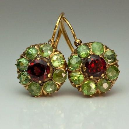 Vintage gold earrings with red and green crystals